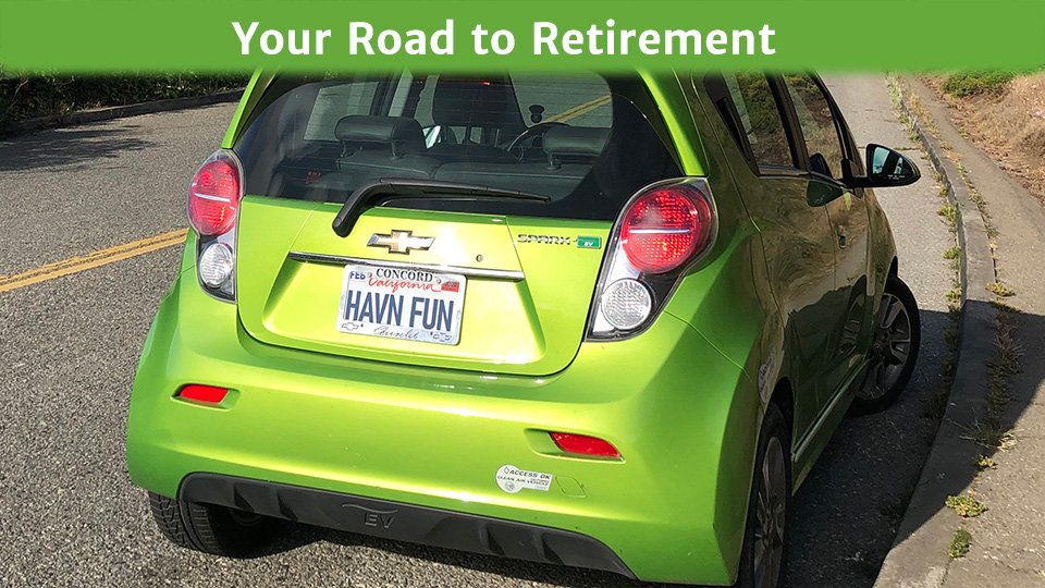 Green car with vanity plate